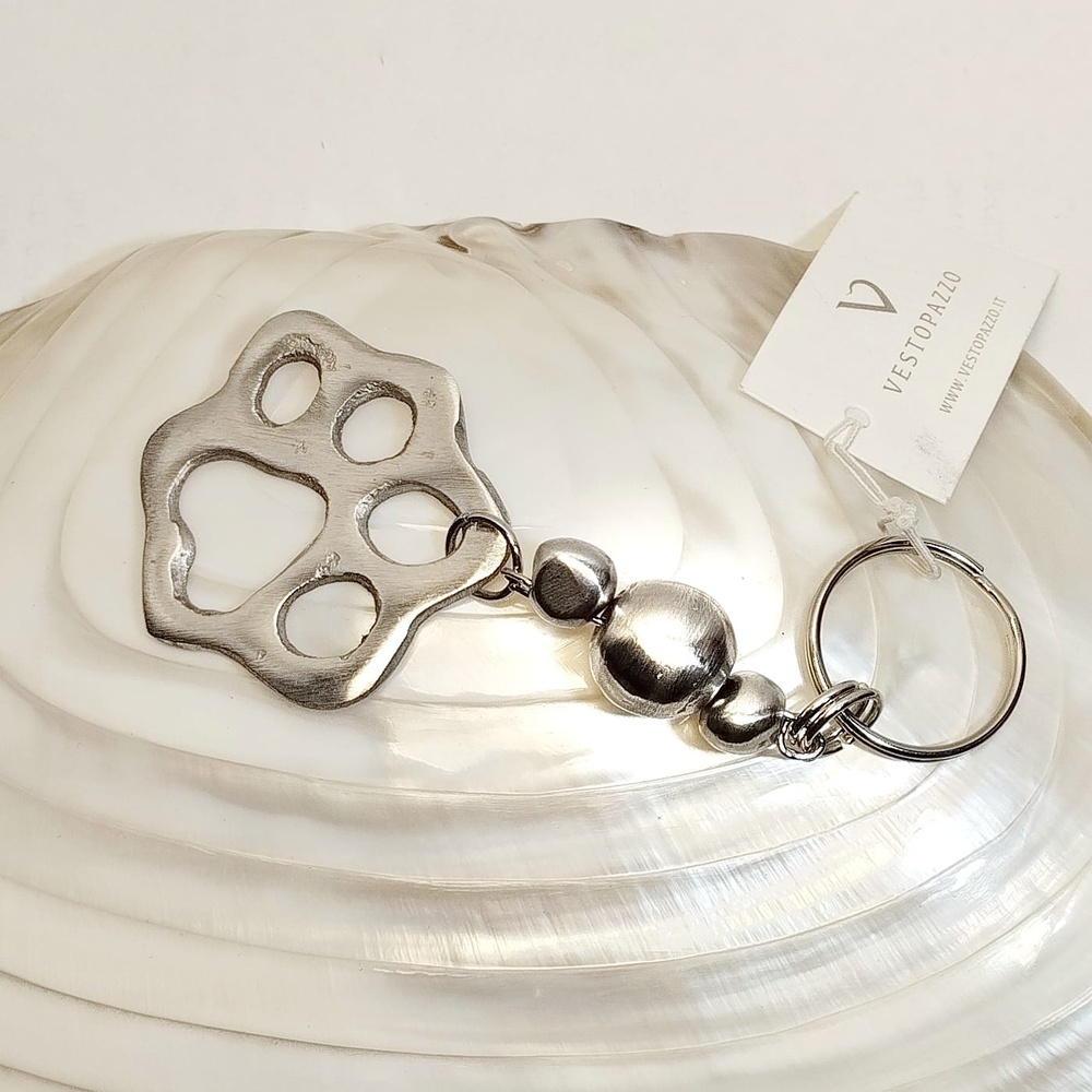 AL06052 Footprint Keychain Aluminum Jewelry Temasarte Vestopazzo Canarias. T-mas, art and gifts 